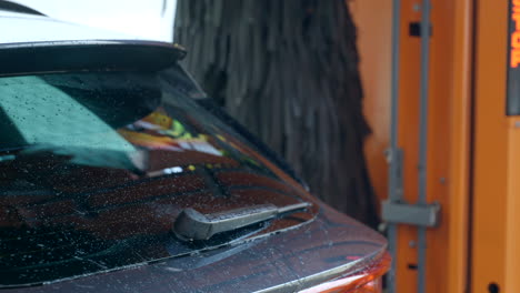 vehicle car wash dryer clearing and removing water droplets from rear window glass