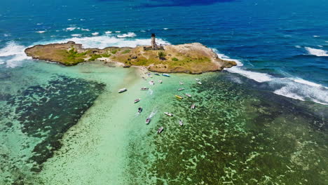 aerial drone view of a lighthouse on ile aux fouquets, ile au phare, bois des amourettes, mauritius