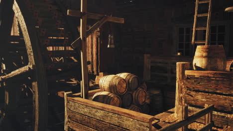 estructura de madera rústica con barriles y una rueda de agua