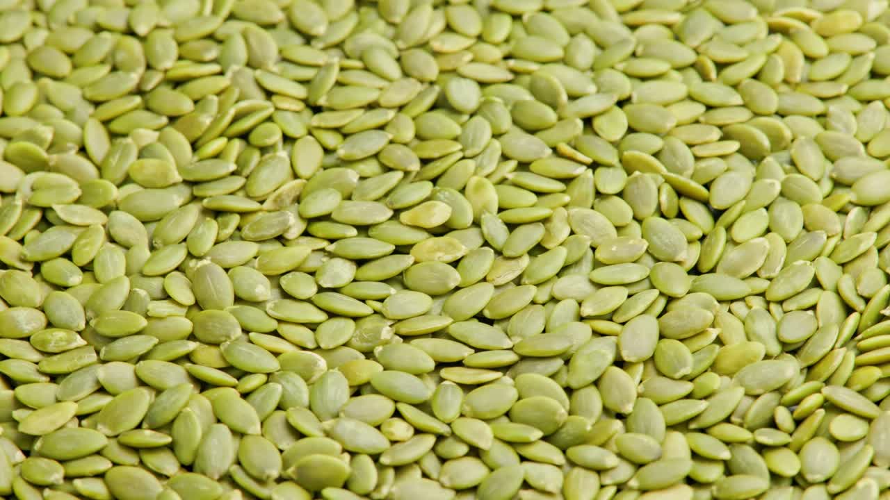 질 벗겨진 호박 씨 전체 프레임 회전 배경