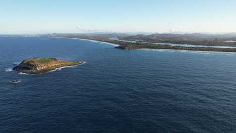 Fingal-Headland-and-Cook-Island--Tasman-Sea---New-South-Wales--NSW---Australia---Flying-Over-Ocean---Aerial-Shot