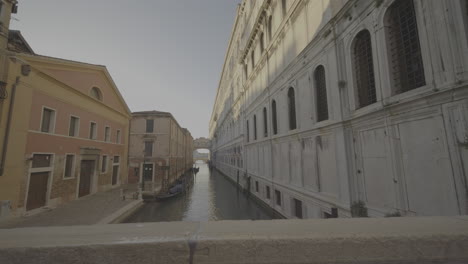 venetian canal with gondola and historic buildings
