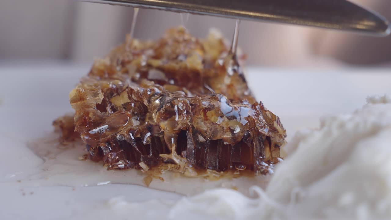 Honeycomb with Honey Drizzle and Knife