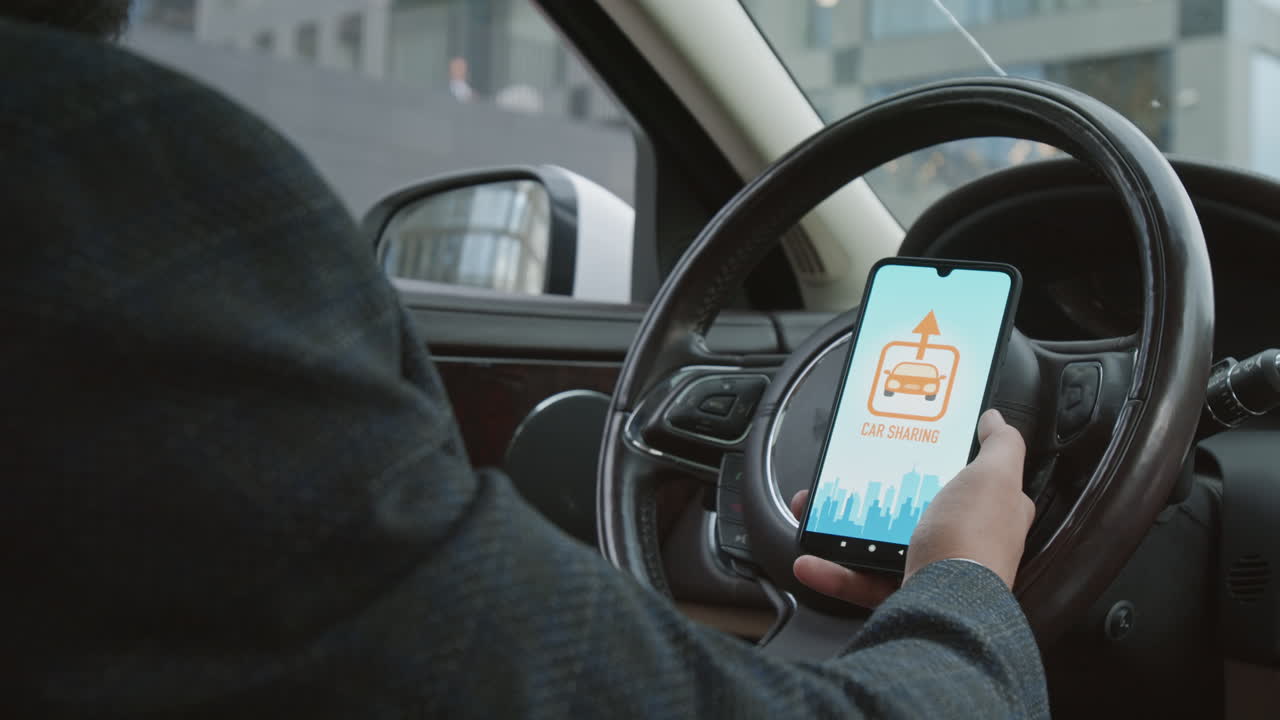 Man Using Car Sharing App