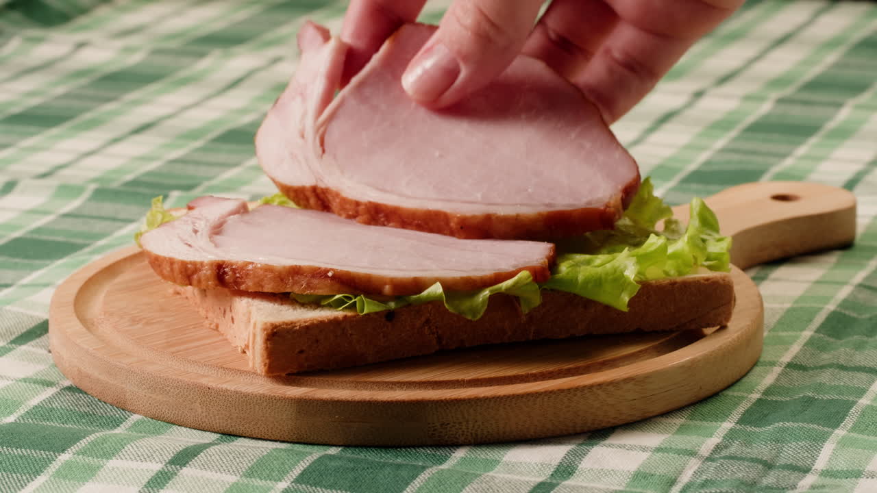 Making a Ham and Lettuce Sandwich