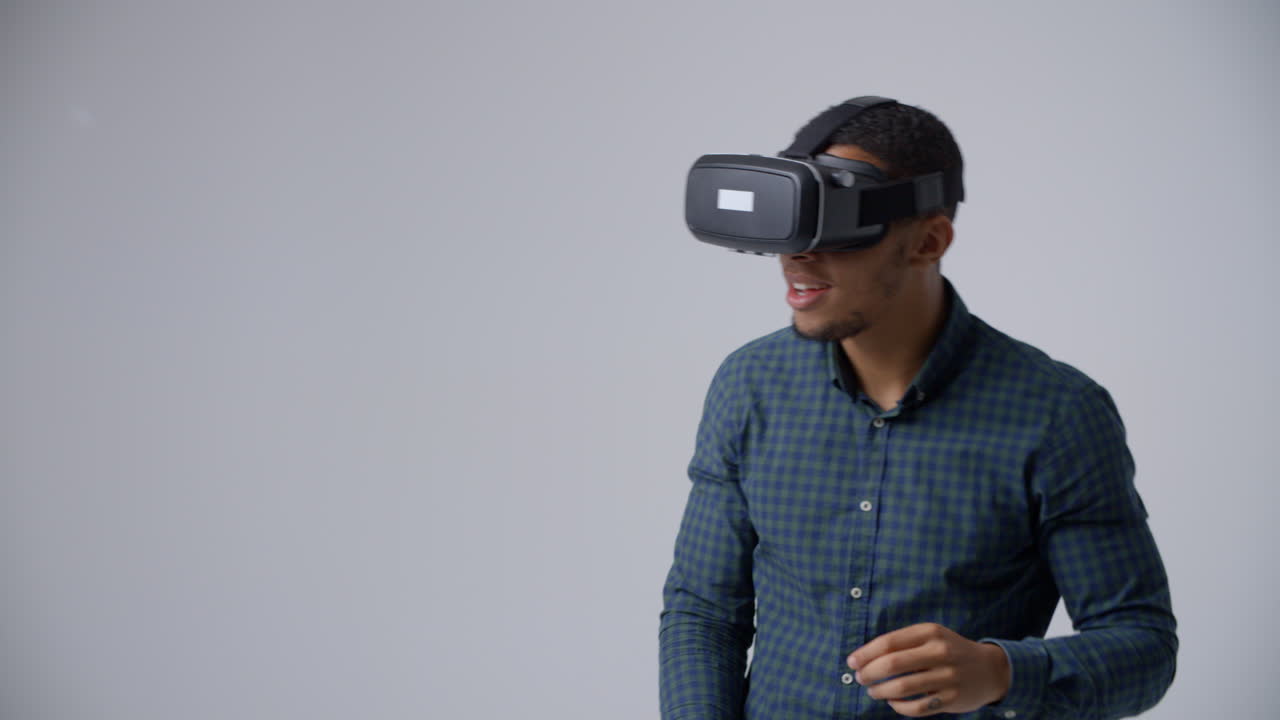 Slow Motion Sequence Of Video Game Designer With VR Headset