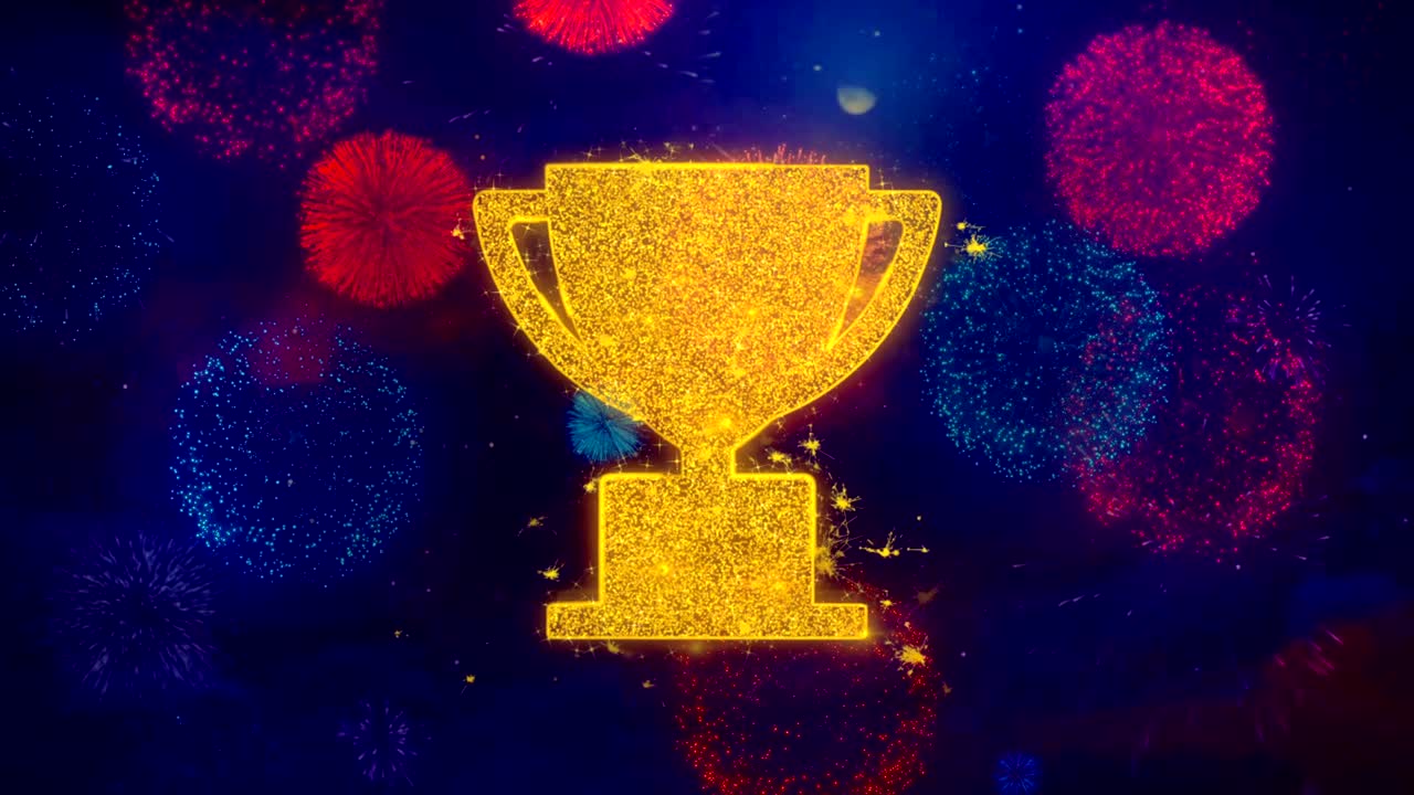 el símbolo del icono de la copa del trofeo en las coloridas partículas de fuegos artificiales.