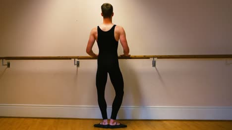 male dancer practicing a ballet dance