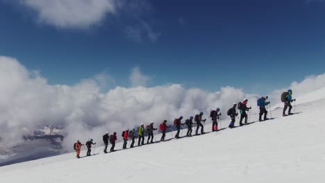 group of hikers climbing a mountain