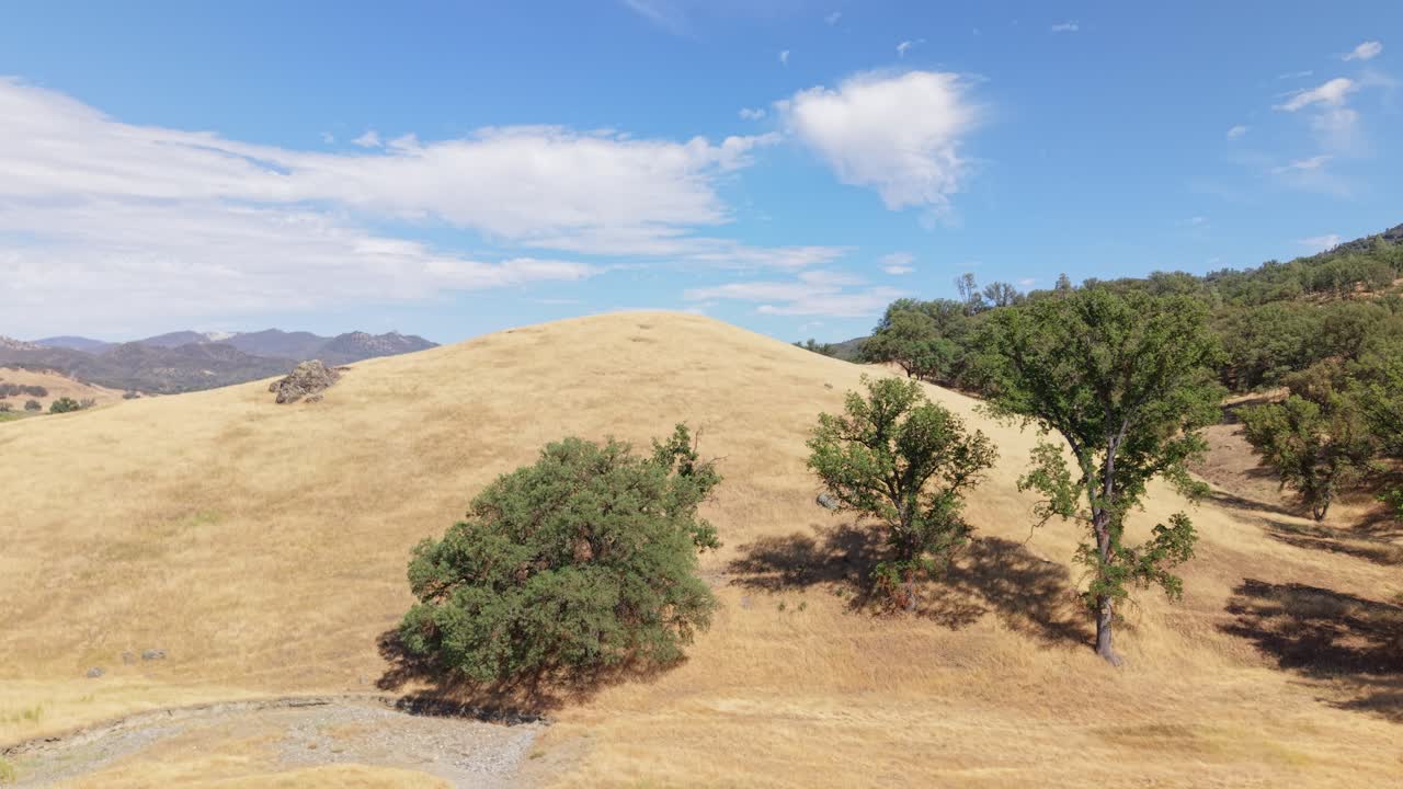 An ascending aerial establishing shot the surroundings of Paicines California.