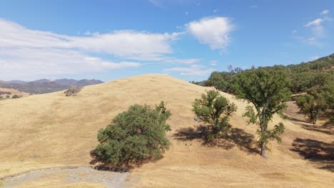 an ascending aerial establishing shot the surroundings of paicines california.