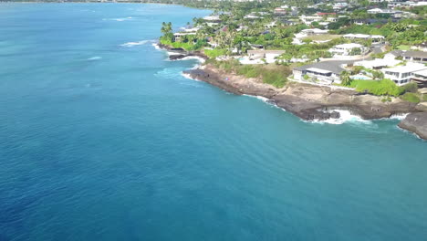 pull back aerial reveal of china walls on coastline of oahu, hawaii