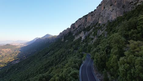 flight over a road that leads along a mountain ridge