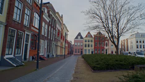 a beautiful walkthrough cinematic scenery in europe in netherlands holland with dutch style authentic architecture design of houses, buildings and streets