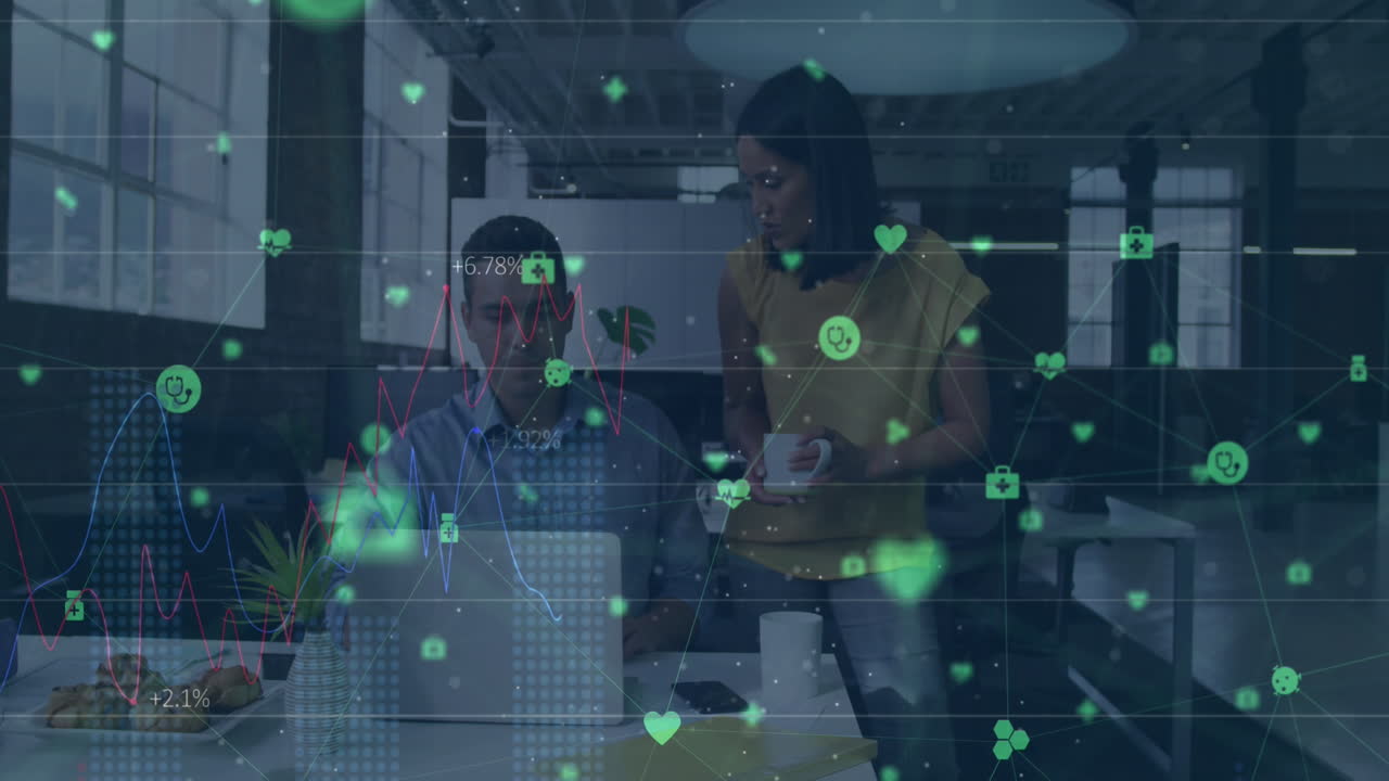 Animation of network of medical icons against diverse man and woman discussing at office