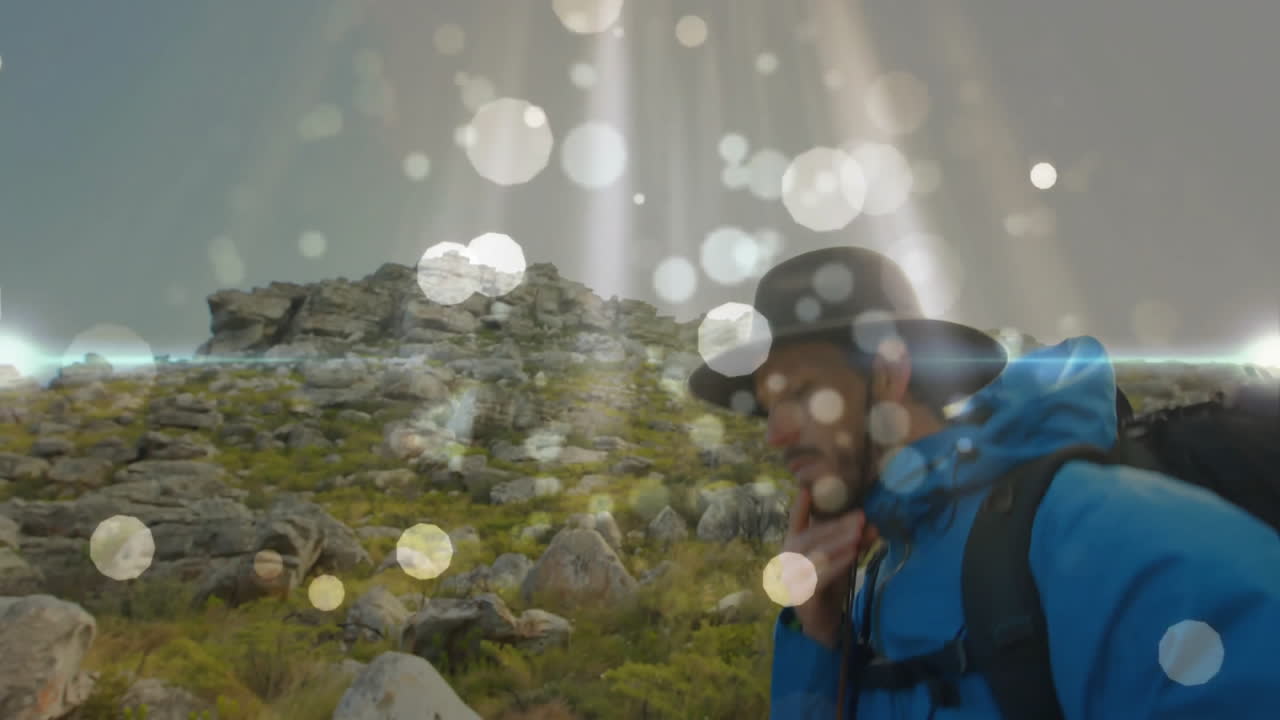 Hiker adjusting jacket on hillside, showing animated heart icon and elevation graph for health