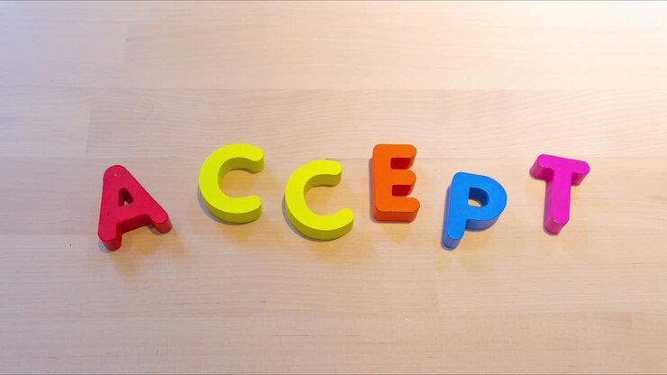 Animazione stop motion del testo "Accetta", parole che saltano per il concetto di accettazione