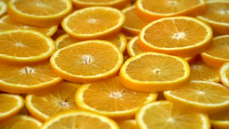 girar frutas de naranjas cítricas frescas. bucle sin costuras girando naranjas en rodajas