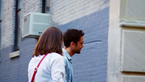 Young-adult-couple-walking-in-Brooklyn-street,-close-up