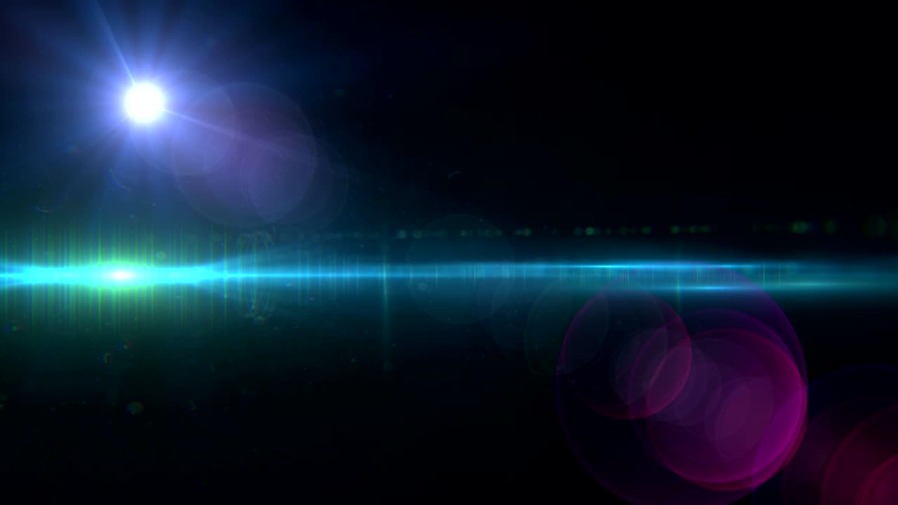 Spot of light and light trail against black background