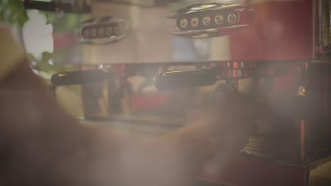 Animation-of-clouds-and-sunlight-with-hands-of-barista-preparing-coffee-using-machine