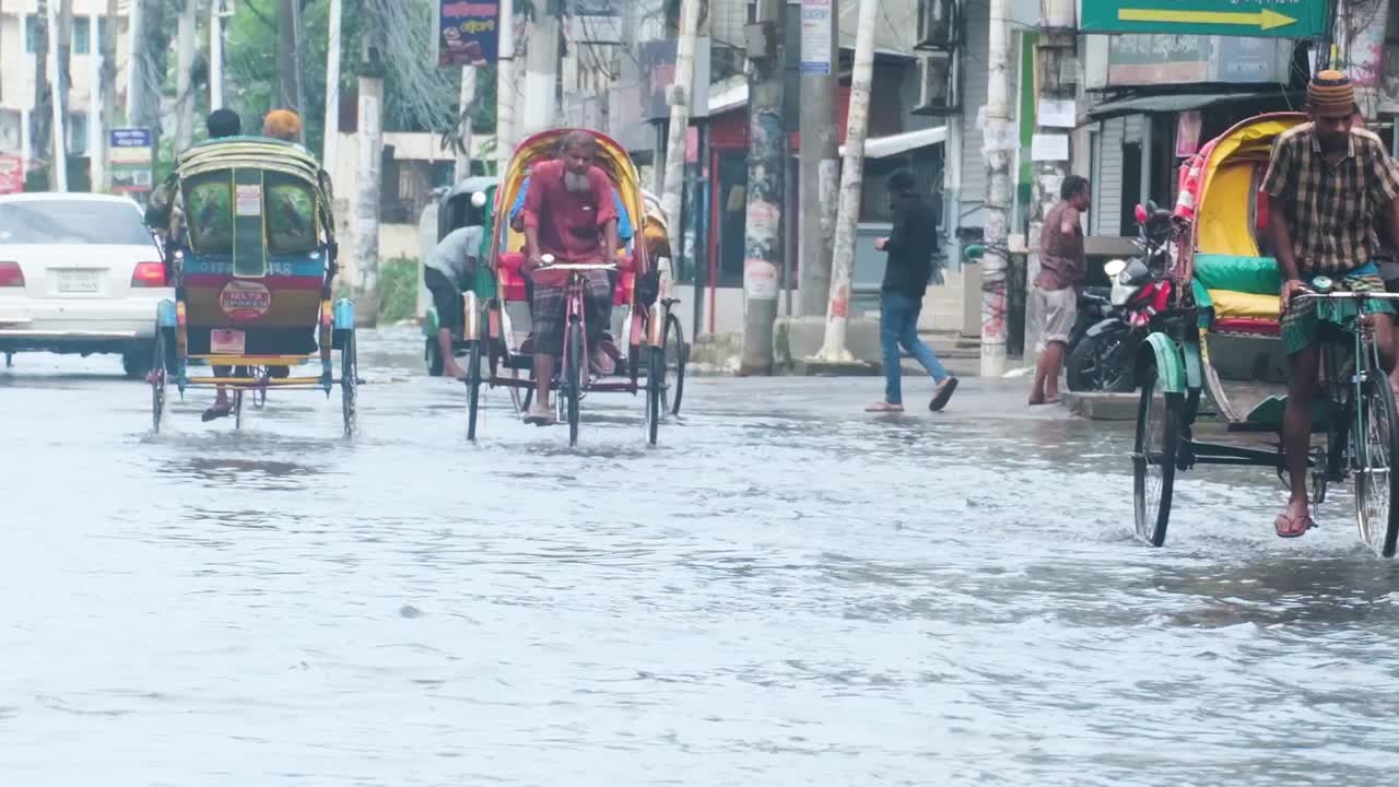 Floodwaters Have Inundated the Streets, Making it Difficult for People ...