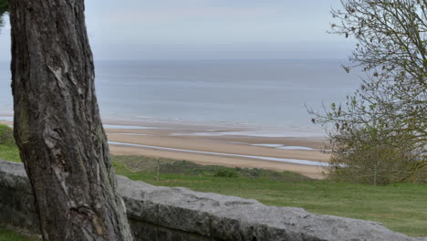 Long-shot-of-the-secluded-Omaha-Beach-landing-area-in-Colleville-sur-Mer,-Normandy,-France