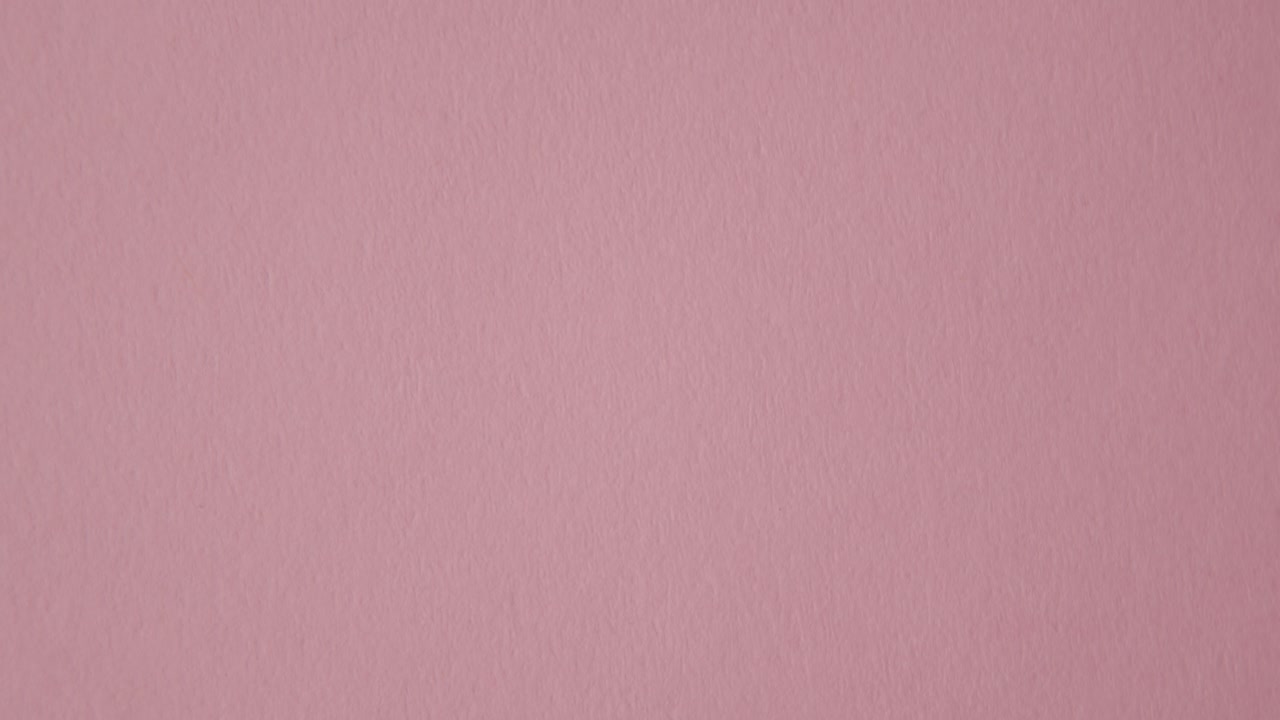 Hand Picking Up Heart Candy With Marry Me Message On Pink Background