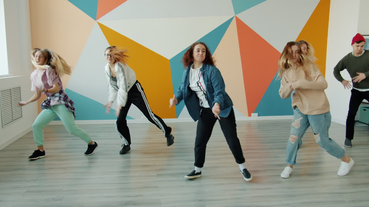 Teenagers Dancing in a Dance Studio