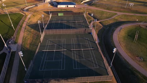 aerial footage of the tennis courts at unity park in highland village texas