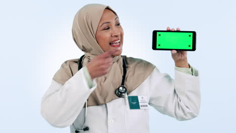 Médico,-Teléfono-Y-Pantalla-Verde-Con-Una-Mujer-árabe