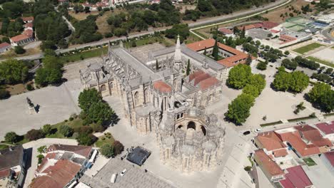 aerial approaching batalha monastery, leiria, portugal