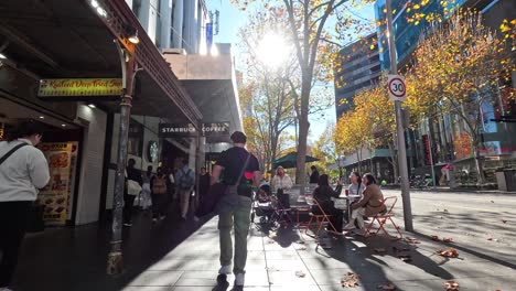 people walking and enjoying melbourne city