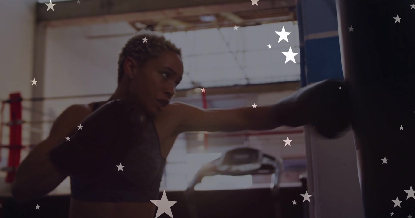 Woman boxer raising gloves, throwing compact punches on heavy bag, star overlay showing rotation