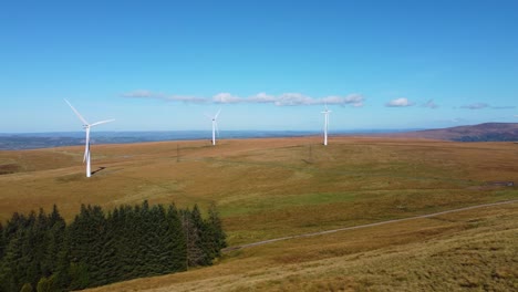 aerial view of a wind farm on a hilly landscape
