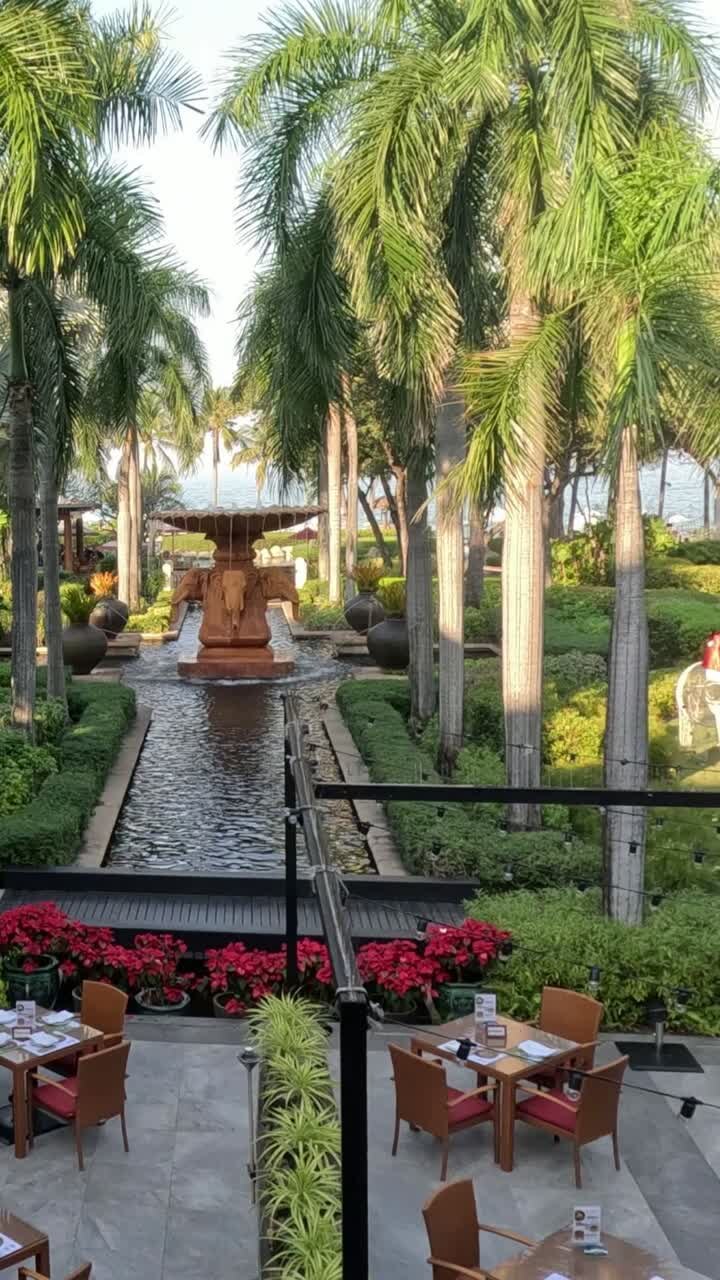 Outdoor restaurant setting in a lush garden