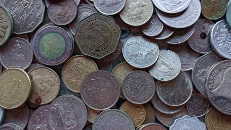 pile world coins from different countries