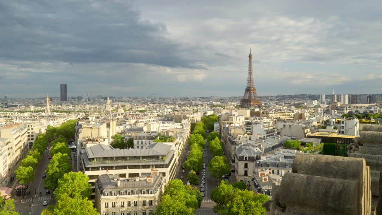 Static view of the Eiffel tower in Paris, France from the Arc de Triomphe on sunny day