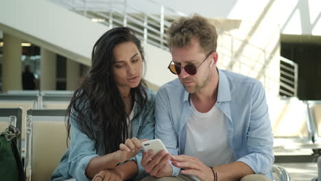 couple waiting at airport