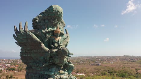 garuda wisnu kencana cultural park flying around object building close up perspective