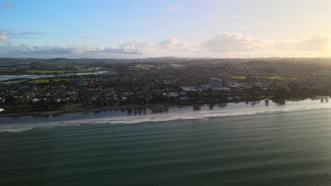 Sunset-flights-over-New-Zealand-beach