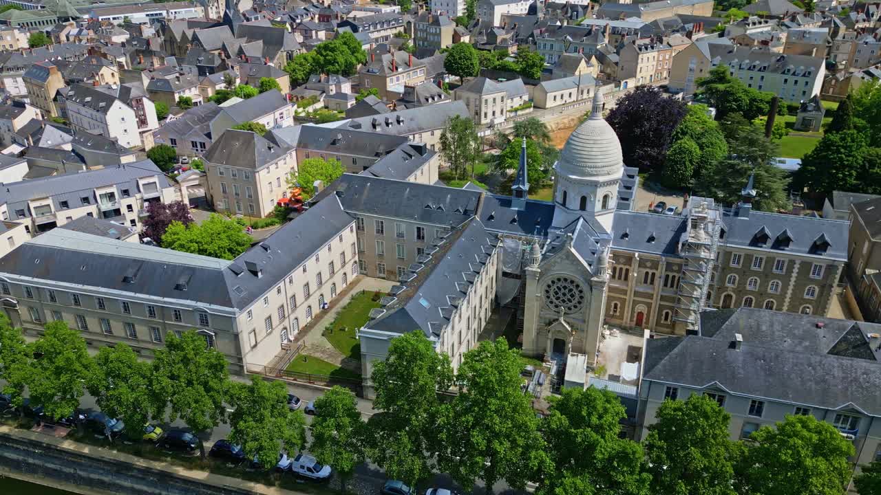 Saint-Julien Hospital and Chapel in Laval in Mayenne, France. Aerial drone sideways