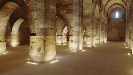 interior of historical monumental building with stone arches and domes