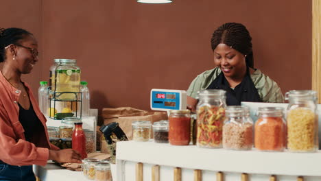 Customer-shopping-for-pasta-and-organic-bio-sauces-in-jars