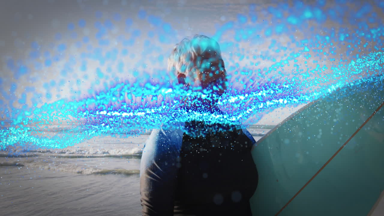 woman standing on beach holding surfboard, featuring swirling digital particles showing technology