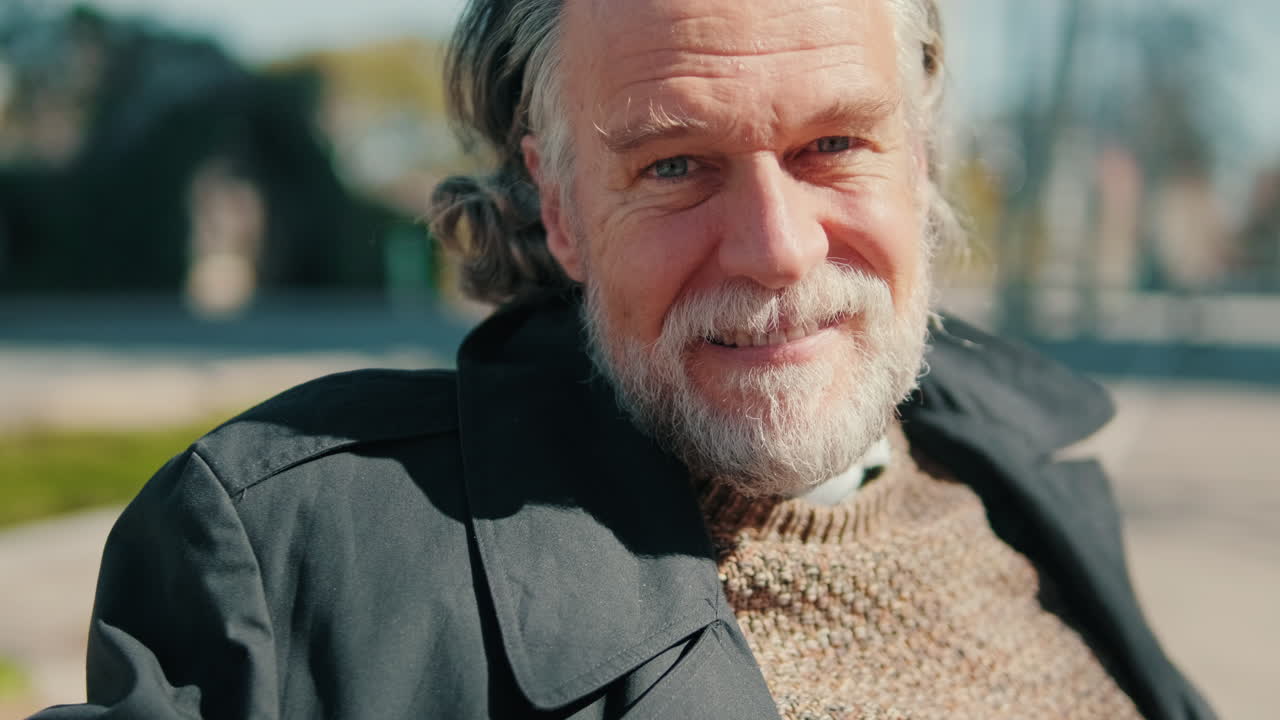 Happy Older Man Smiling in the Park