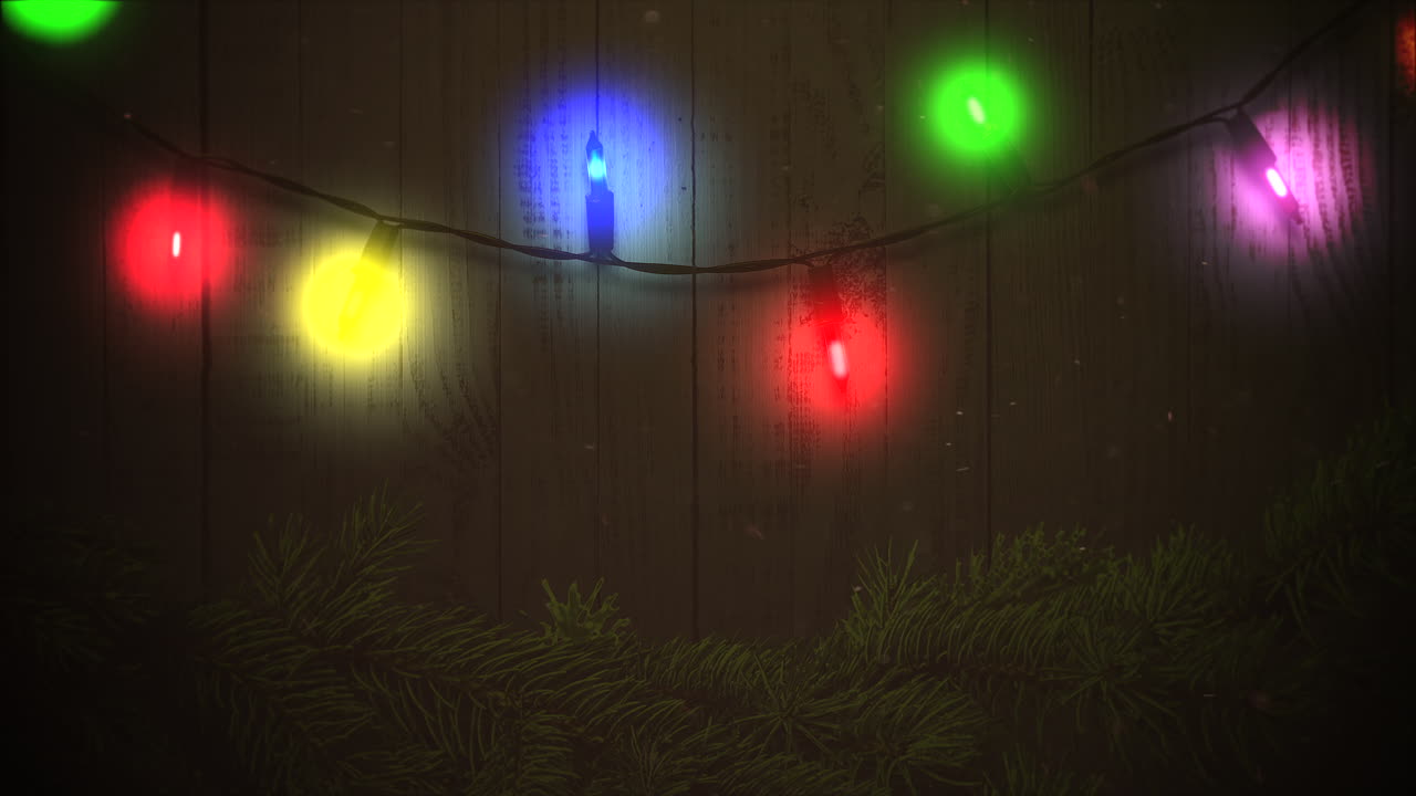 primer plano animado guirnalda colorida y ramas de árboles verdes de navidad en madera 2