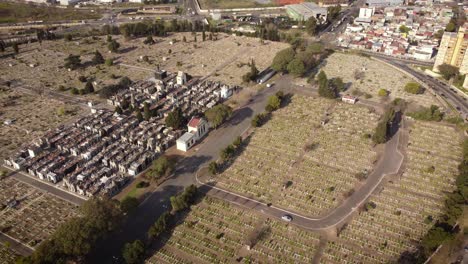 circular descending drone view over the cemetery of cementerio de flores in the city of buenos aires