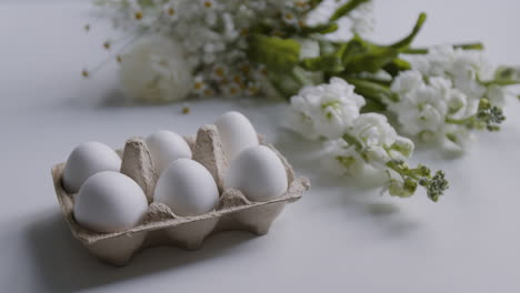 white eggs and flowers