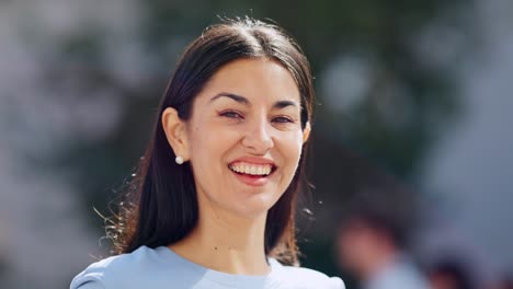close-up of a woman smiling and laughing